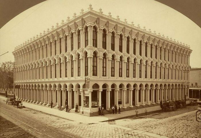 Stunning example of Old American architecture featuring a grand historic building with arched windows and ornate details.