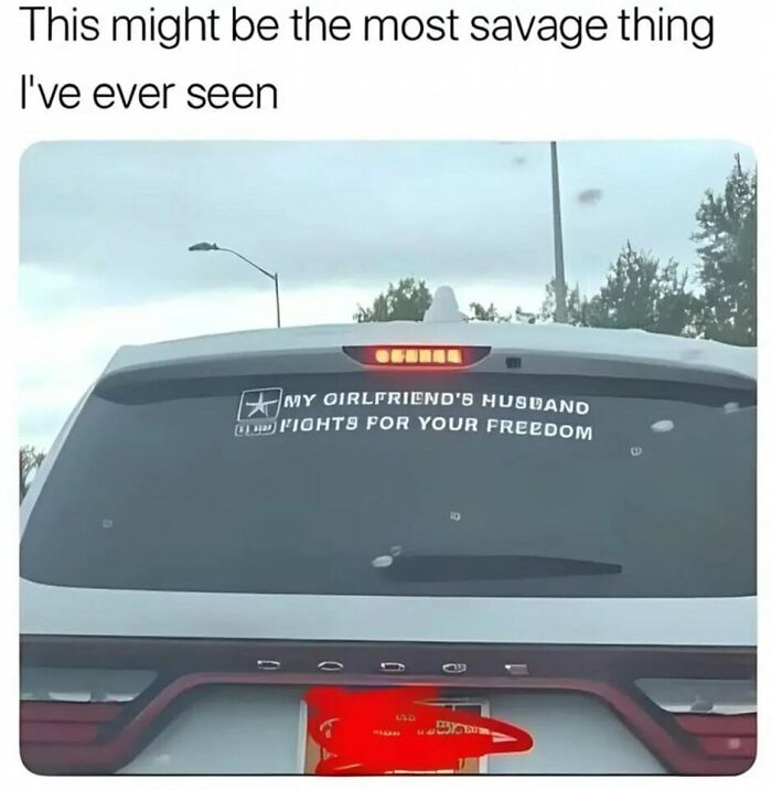 Car with humorous meme sticker about a girlfriend's husband fighting for freedom.