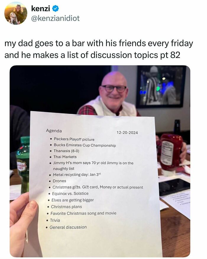 Man holding a list of discussion topics at a bar, as part of the Middle Class Fancy memes.