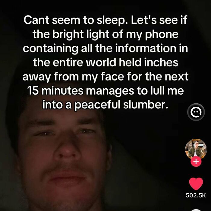Man lying in bed with phone light, humorous text about struggling to sleep, highlighting a relatable and wholesome moment.