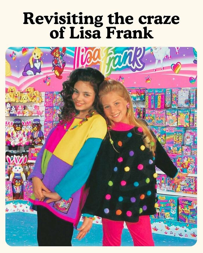 Two girls in colorful Lisa Frank sweaters pose in a vibrant store filled with Lisa Frank merchandise.