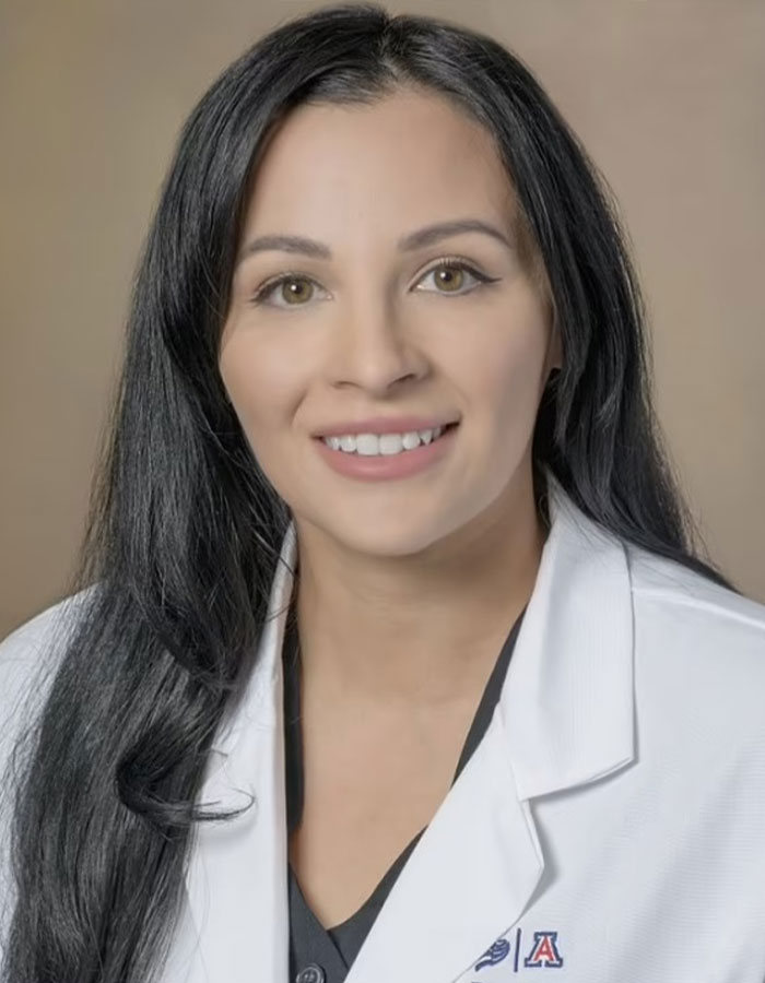 Smiling woman in a white coat, related to hot car incident case keywords.