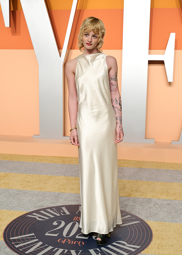 Esther Rose McGregor in a white gown at the Oscars after-party red carpet. Esther Rose McGregor in a white gown at the Oscars after-party red carpet.