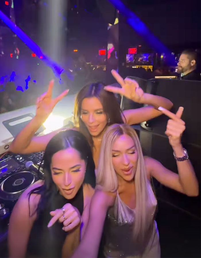 Eva Longoria celebrates her 50th birthday with friends, dancing at a lively nightclub party.