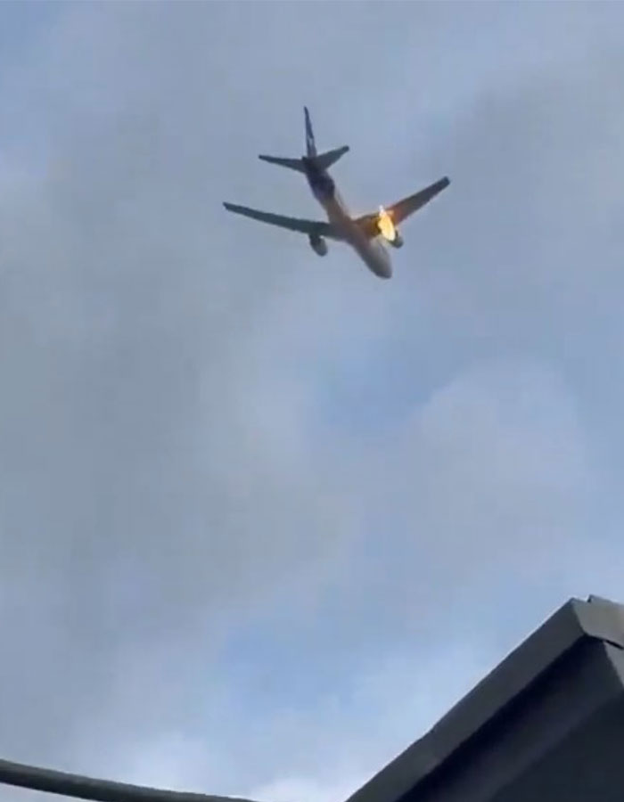 FedEx aircraft in flight with fire visible, leading to packages delayed.
