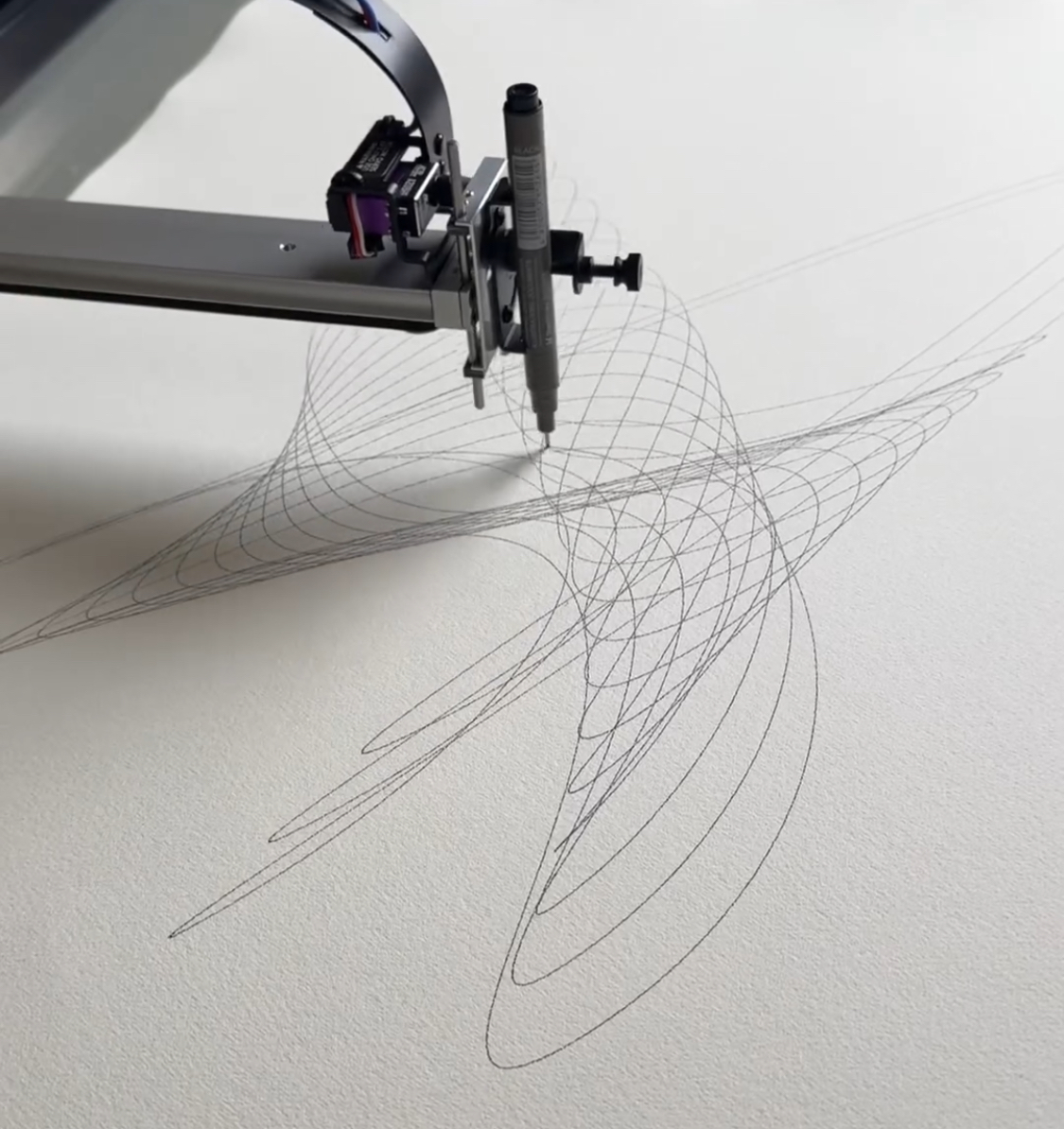 Machine creating intricate design representing unique brain activity imprint for tattoo art.