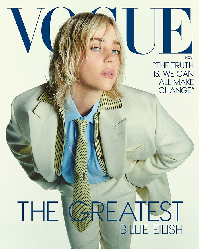 Billie Eilish on Vogue cover wearing a cream suit and striped tie.