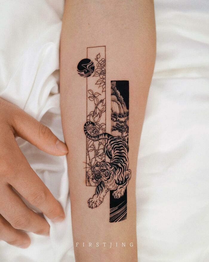 Fine-line tattoo of a tiger with floral and geometric elements on an arm.