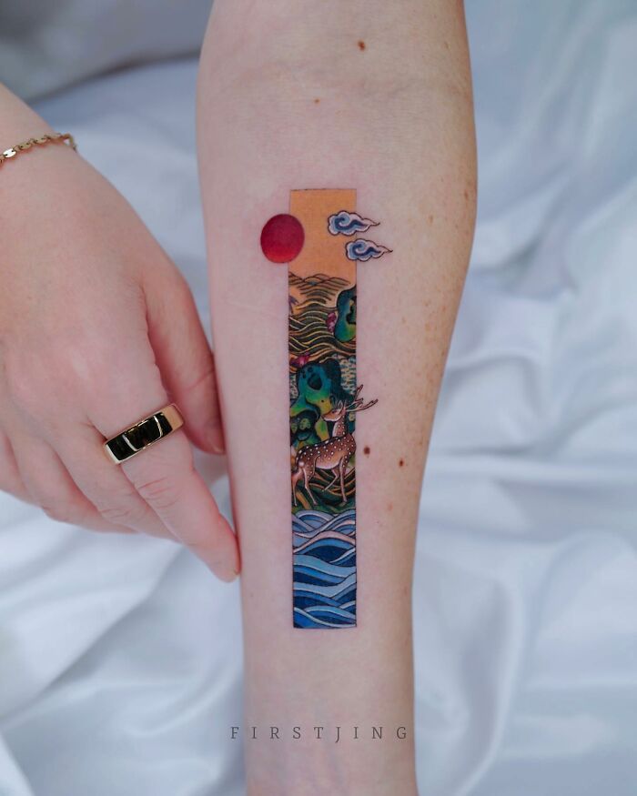 Fine-line tattoo of a dreamy landscape with deer and waves on an arm, showcasing intricate details.