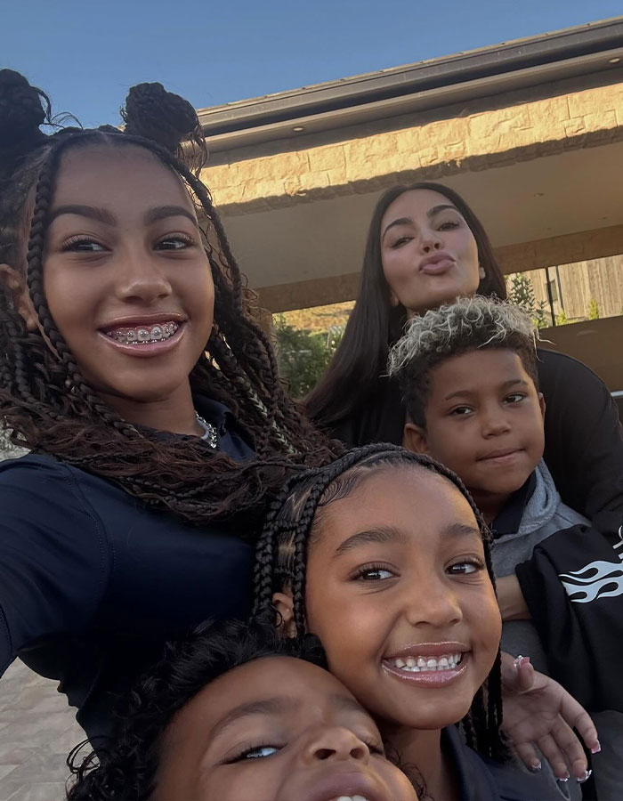 Family enjoying time together outdoors, highlighting key relationships and expressions. Family enjoying time together outdoors, highlighting key relationships and expressions.