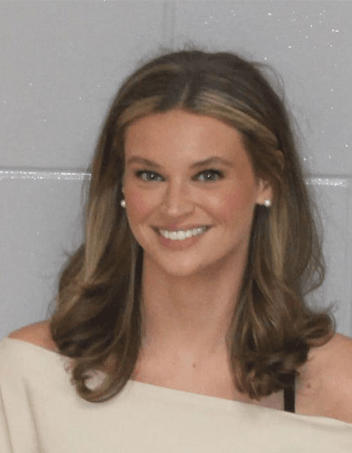 Smiling woman with shoulder-length hair and pearl earrings, relevant to Georgia sorority girl viral news. Smiling woman with shoulder-length hair and pearl earrings, relevant to Georgia sorority girl viral news.