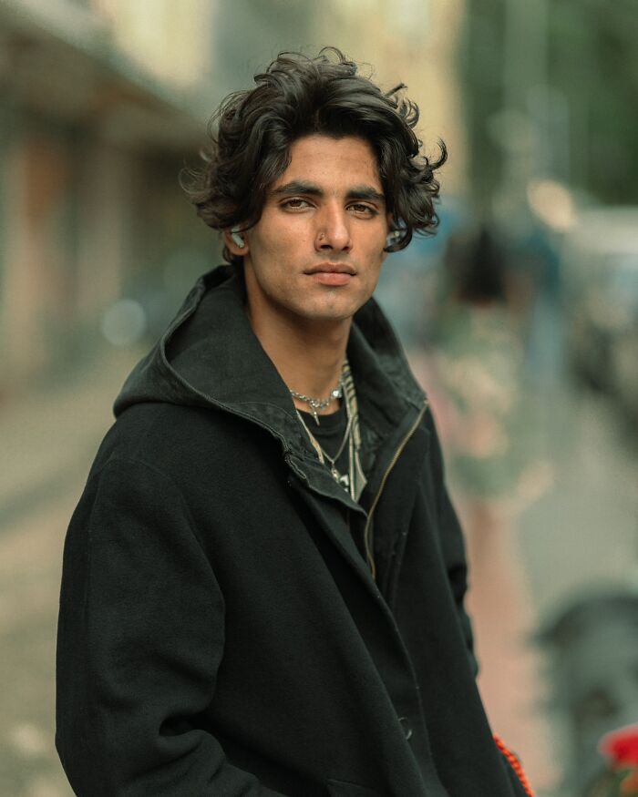 Portrait of a stranger captured by an Indian photographer, highlighting natural beauty with a soft background.