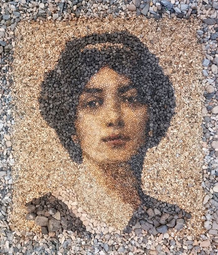 Intricate mosaic portrait made from stones and pebbles by British artist.