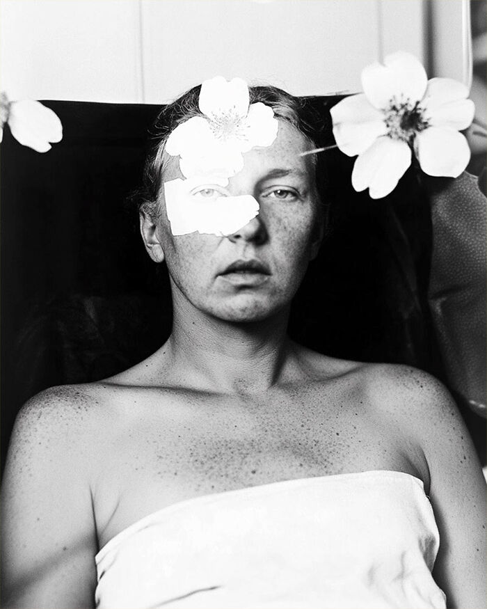 A creative AI image featuring a person with flowers on their face, showcasing unique artistic expression.