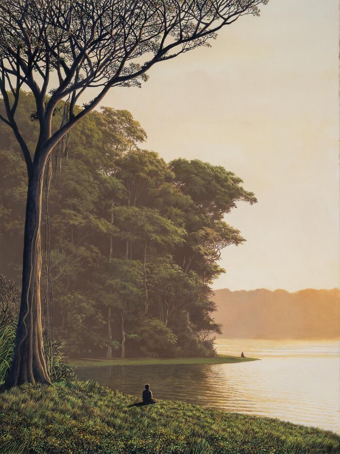 Calm lakeside landscape by Tomas Sanchez, featuring a lone figure meditating near water's edge amid lush greenery.