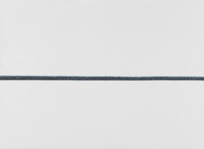 A minimalistic horizontal line dividing a white canvas, symbolizing reflection in Tomas Sanchez's meditative art landscapes.