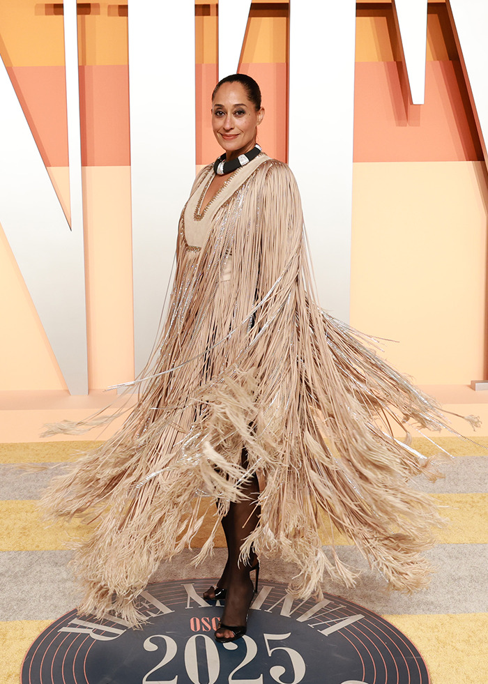 Tracee Ellis Ross in a stylish fringed dress at the Oscars after party, highlighting nepo baby fashion on the red carpet. Tracee Ellis Ross in a stylish fringed dress at the Oscars after party, highlighting nepo baby fashion on the red carpet.