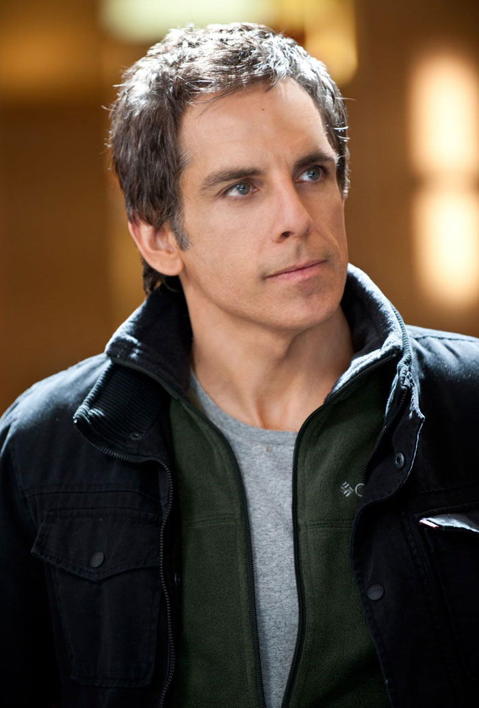 A person in a black jacket, associated with not-self-made-celebs, looks to the side in a candid moment.