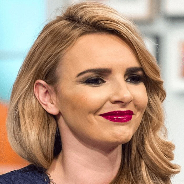 A woman with blonde hair and bright lipstick expressing an opinion on being rated a ten.