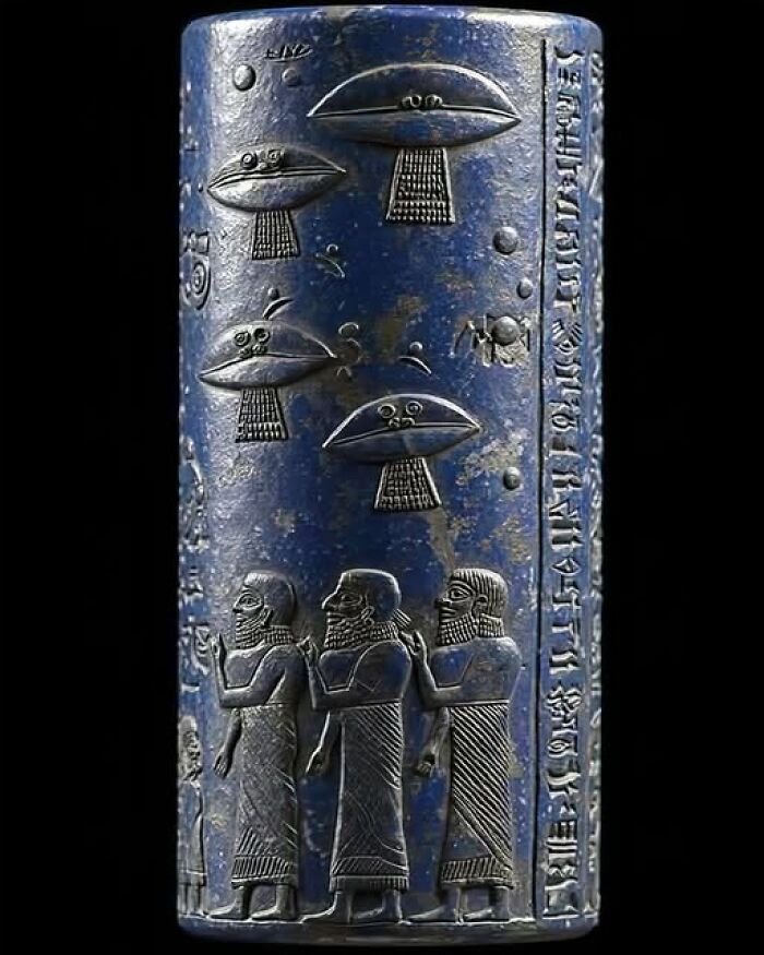 Ancient cylinder seal depicting figures and symbols from thousands of years ago on a blue surface.