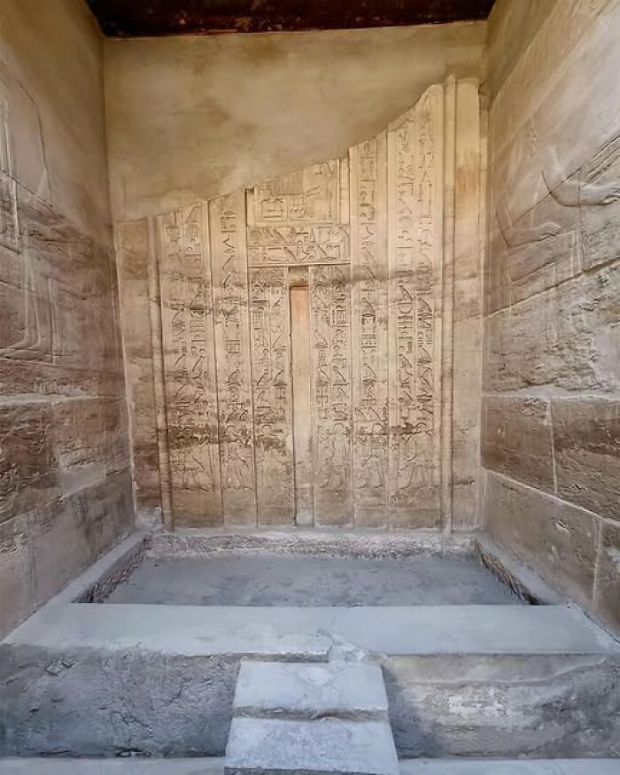 Ancient Egyptian hieroglyphs carved on stone walls, showcasing rich ancient history and cultural heritage.