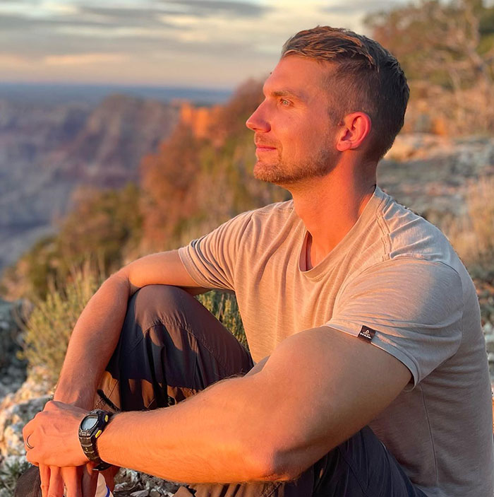 Man sitting outdoors at sunset, associated with YouTube star tragedy news. Man sitting outdoors at sunset, associated with YouTube star tragedy news.