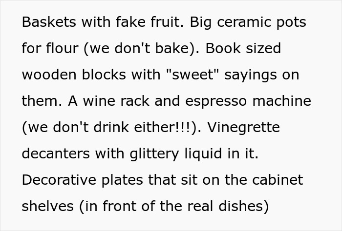 Kitchen decor items including fake fruit and decorative plates. Kitchen decor items including fake fruit and decorative plates.