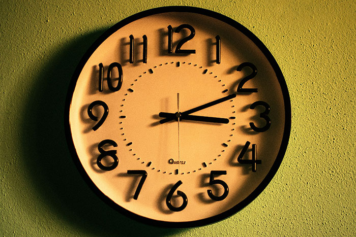 Wall clock showing 10:10, symbolizing basic knowledge of telling time.