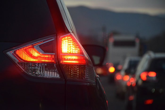 Brake lights in traffic, emphasizing basic knowledge for safe driving practices.