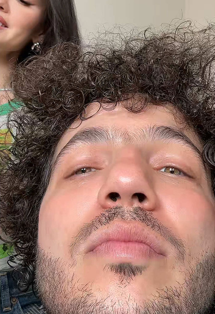 Close-up of a man with freshly plucked eyebrows, showing transformation. Close-up of a man with freshly plucked eyebrows, showing transformation.