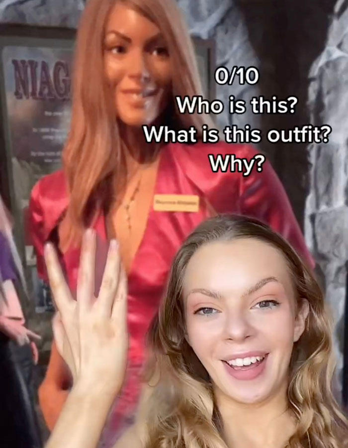 Young woman reacts to Beyoncé's controversial country-themed wax figure with expressive gestures. Young woman reacts to Beyoncé's controversial country-themed wax figure with expressive gestures.