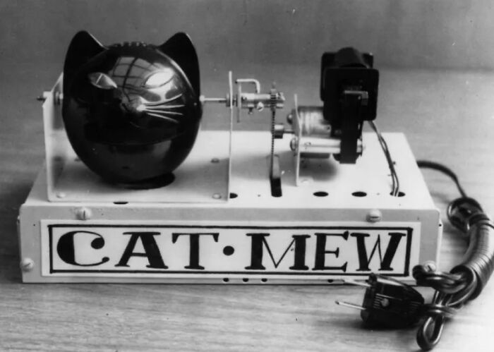 Vintage Cat-Mew machine, a quirky invention from the past, showcasing its mechanical design and unique concept.