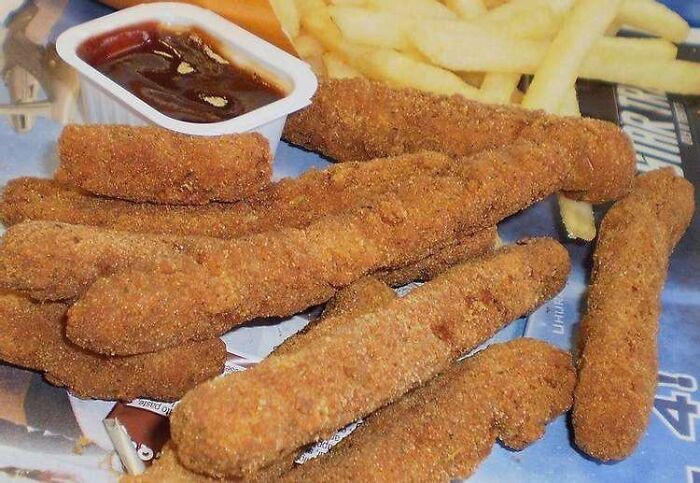 Breaded chicken fries with barbecue sauce and French fries, representing nostalgic discontinued products.