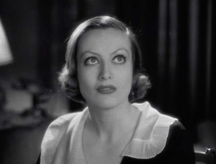 Black and white photo of a vintage actress with classic hairstyle, embodying the essence of celebrities who disappeared.