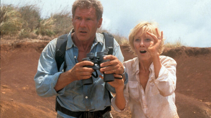 Two people in an adventurous scene, holding binoculars, symbolizing celebrities who disappeared from the media.