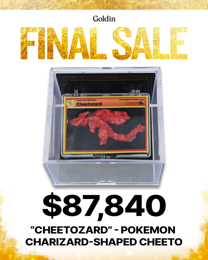 Pok&eacute;mon Charizard-shaped Cheeto sold for $87,840 at auction, labeled "Chetozard," in a clear display case.