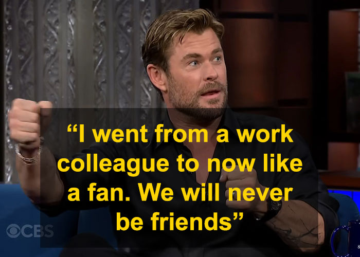 Chris Hemsworth discussing friendship regrets at Oscars on a talk show, gesturing with hands.