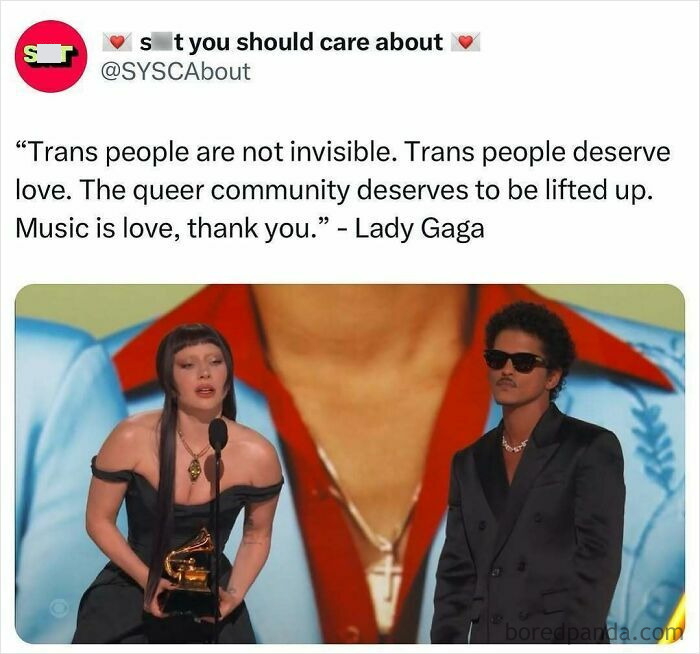 Two people on stage with a quote about love and visibility for the trans and queer community from Lady Gaga.