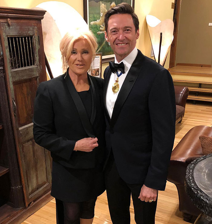 A couple in formal attire, highlighting a moment amid divorce challenges.