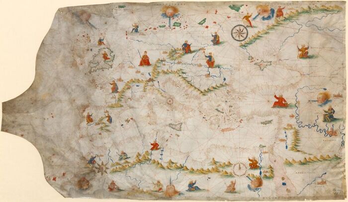 A really old map with colorful illustrations used for exploration and navigation.