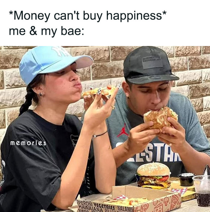 Couple enjoying fast food together, highlighting a fun food-related meme moment.