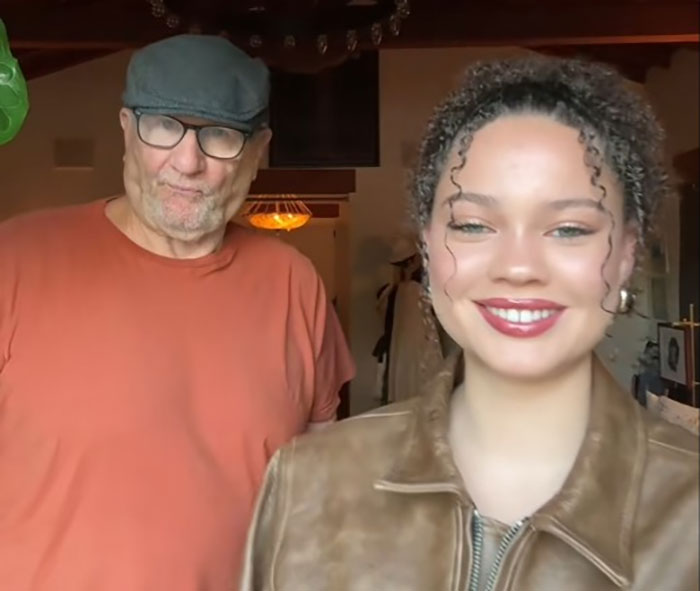 Ed O'Neill with daughter in cozy home setting, smiling and relaxed.
