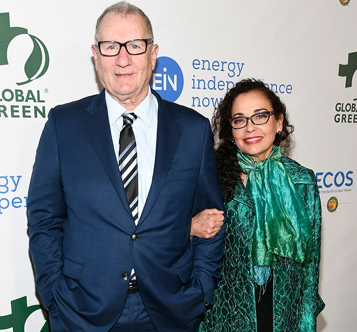 Ed O'Neill with daughter at event, wearing a suit and glasses, both smiling for the camera.
