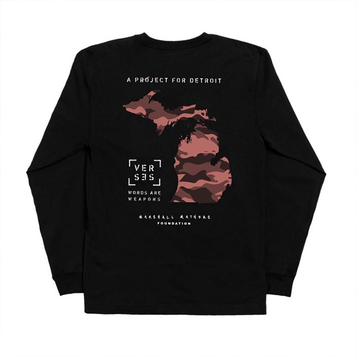 Black shirt with Michigan map and text "A Project for Detroit," relating to Eminem's net worth initiatives.