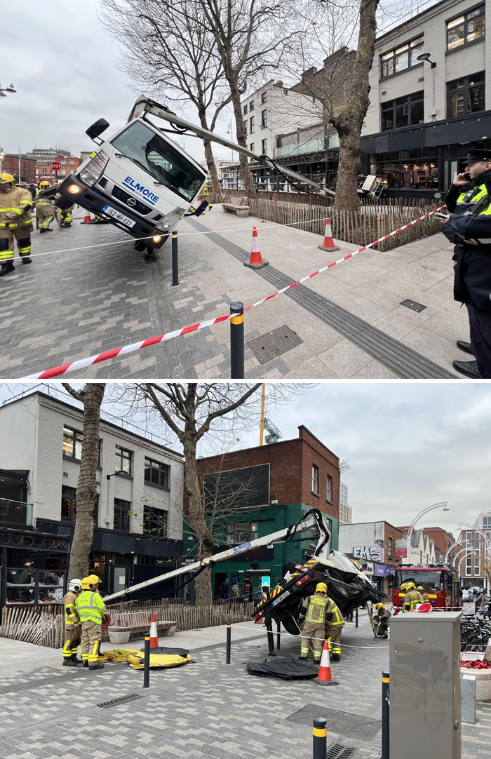 Crane truck tips over as firefighters handle the worst day at work emergency scene.