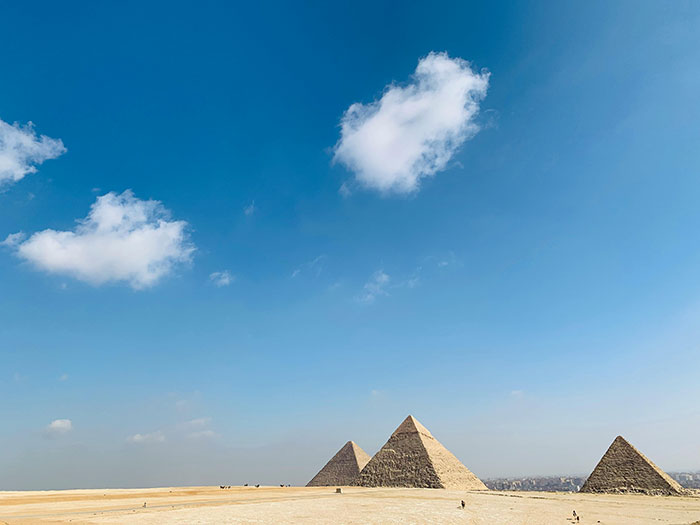 Pyramids of Egypt under a clear blue sky. Pyramids of Egypt under a clear blue sky.