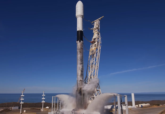 SpaceX rocket on launch pad with clear skies, linked to delayed astronaut rescue mission. SpaceX rocket on launch pad with clear skies, linked to delayed astronaut rescue mission.