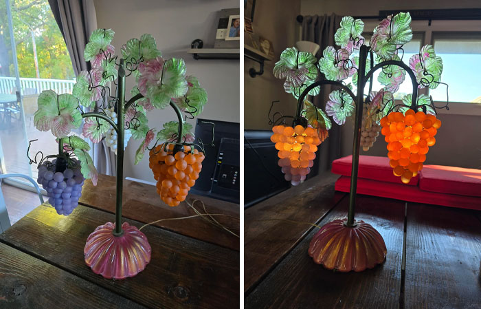 Vintage grape lamp lit and unlit on a wooden table showing intricate details.