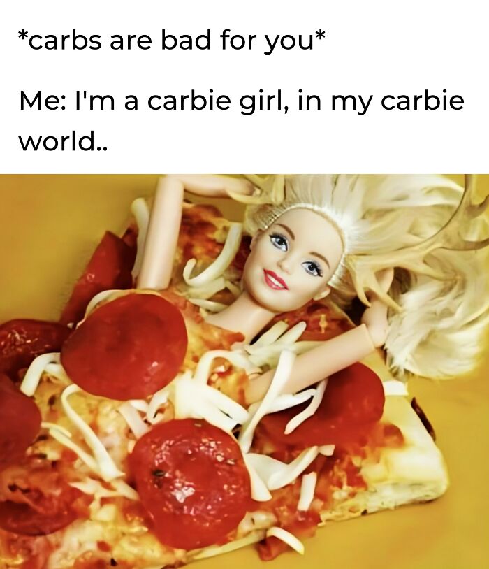 A doll surrounded by pizza and cheese, humorously illustrating a food meme about carbs.
