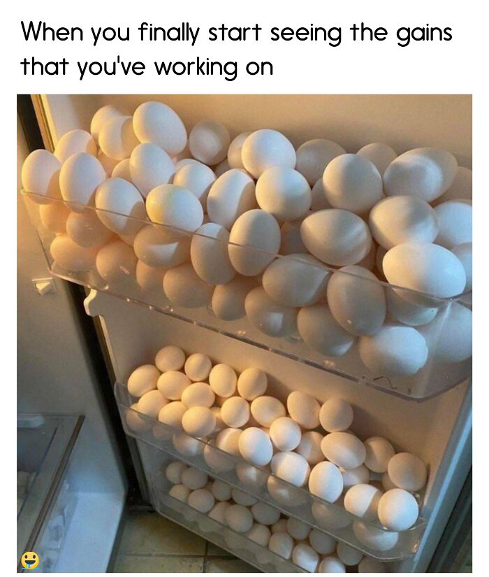 Fridge stocked with eggs, humorously showing gym gains metaphor, captioned with a fitness meme.